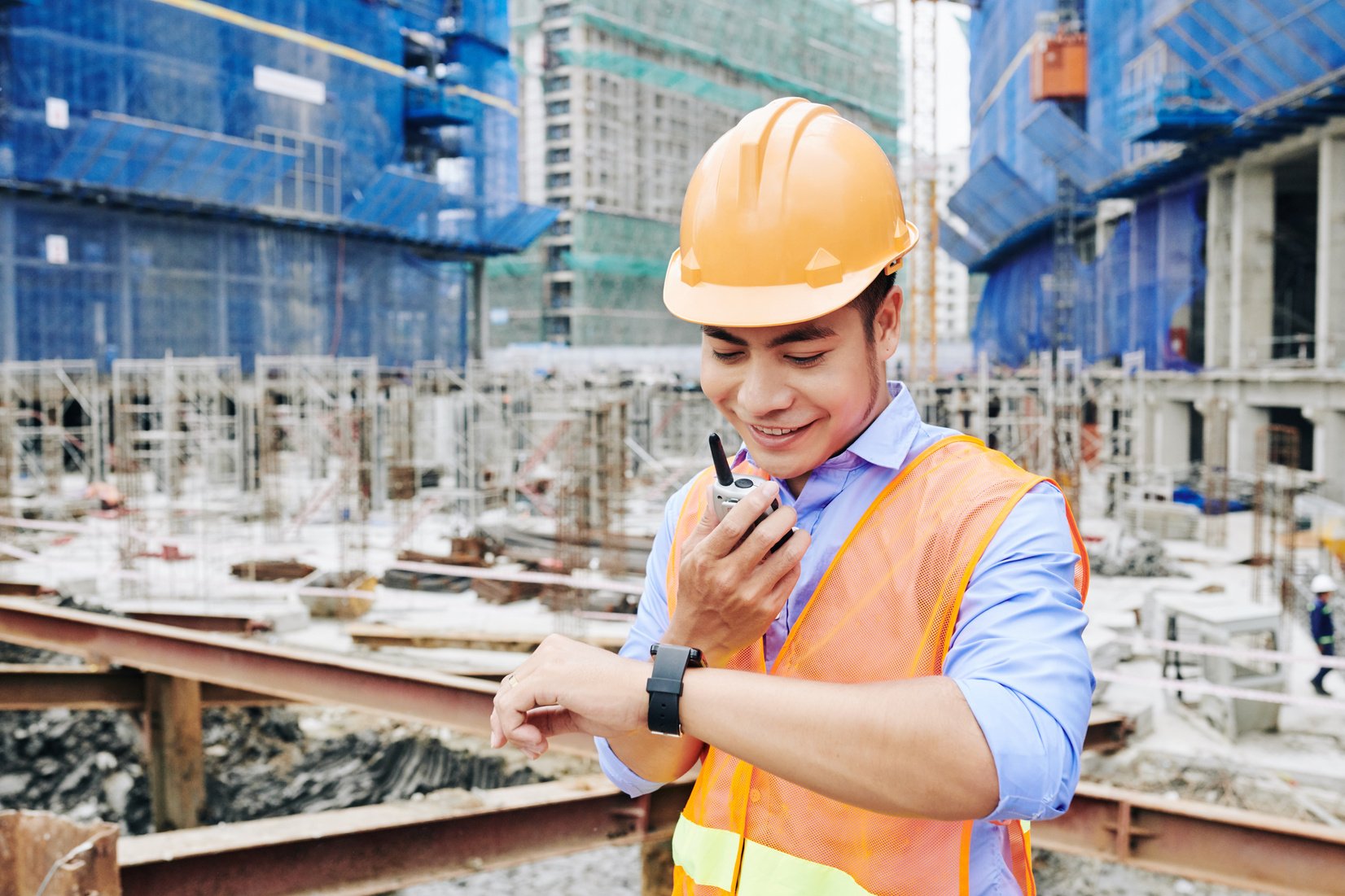 Construction Engineer Checking Time